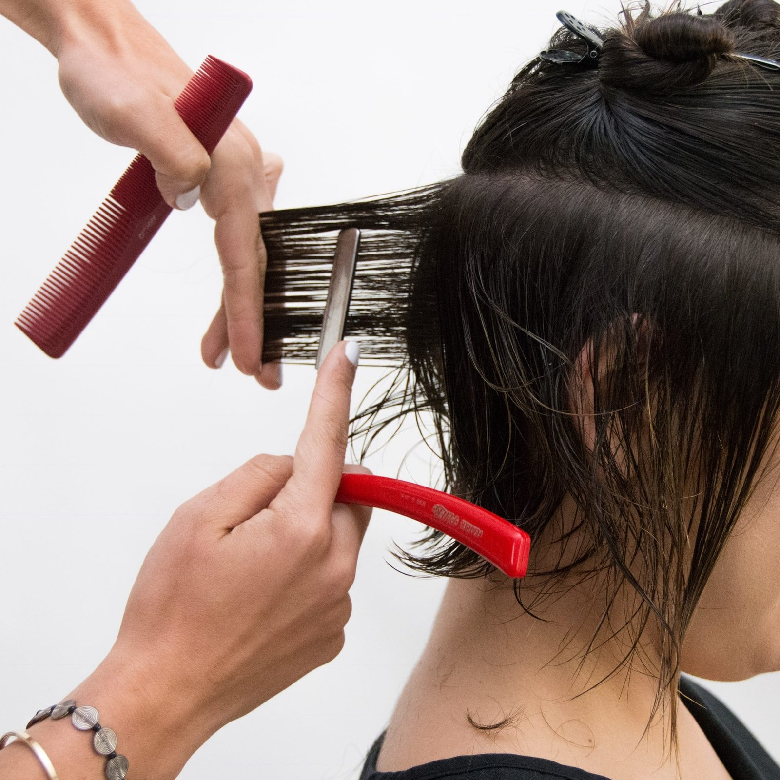 “Freelance hairstylist in Philadelphia working in a professional chair rental studio with included amenities.”